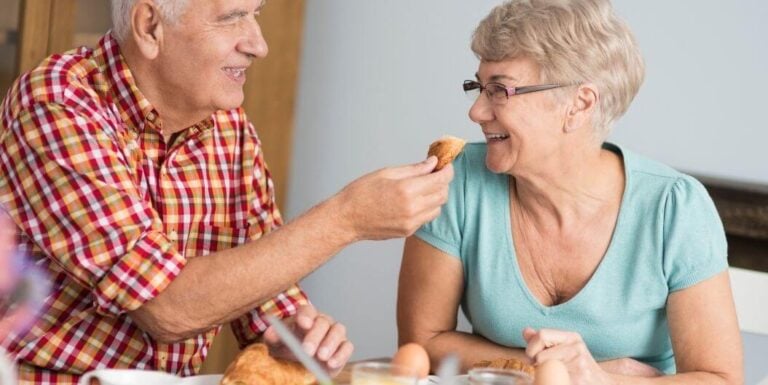 Seniors Sharing Meals in a Senior Living Community